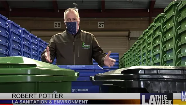Screenshot of an image from LA This Week featuring Robert Potter explaining what goes in each bin.