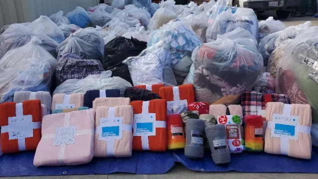 Bags and piles with collected blankets