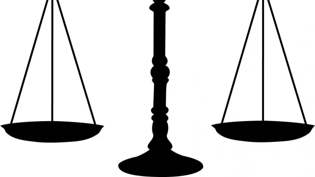 Image of legal scales black silhouette